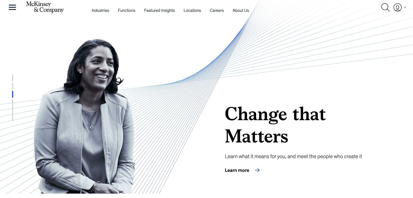 Professional woman smiling against a graphic background with text "change that matters" on a corporate website.