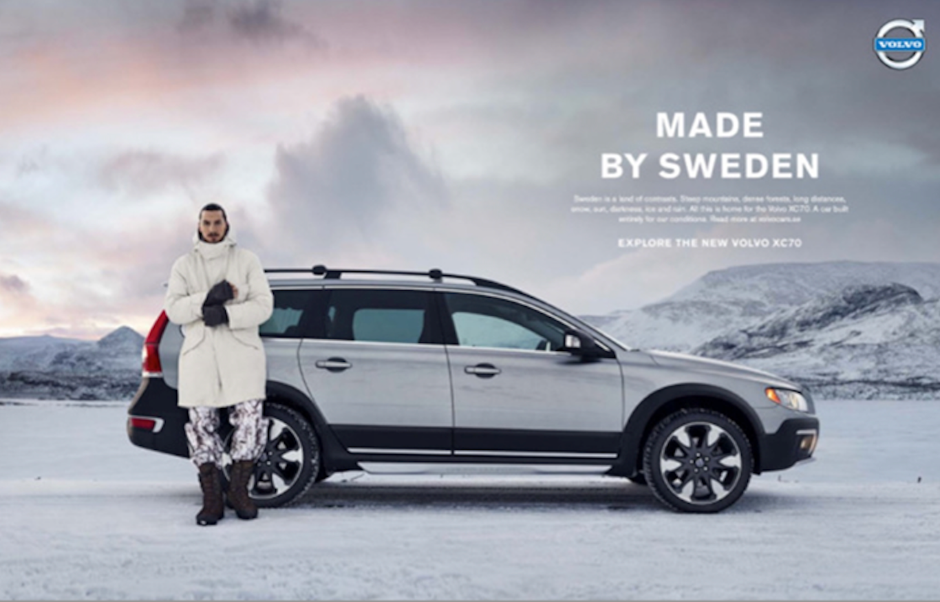 Zlatan stands beside a volvo xc90 in a snowy landscape, under the tagline "made by sweden.