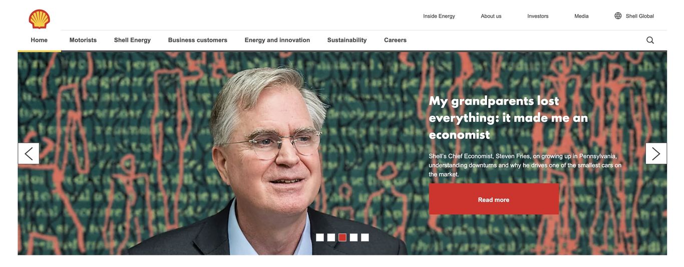 A middle-aged man in business attire smiles in front of a digital background with financial graphs, alongside a website banner featuring an article teaser about an economist.