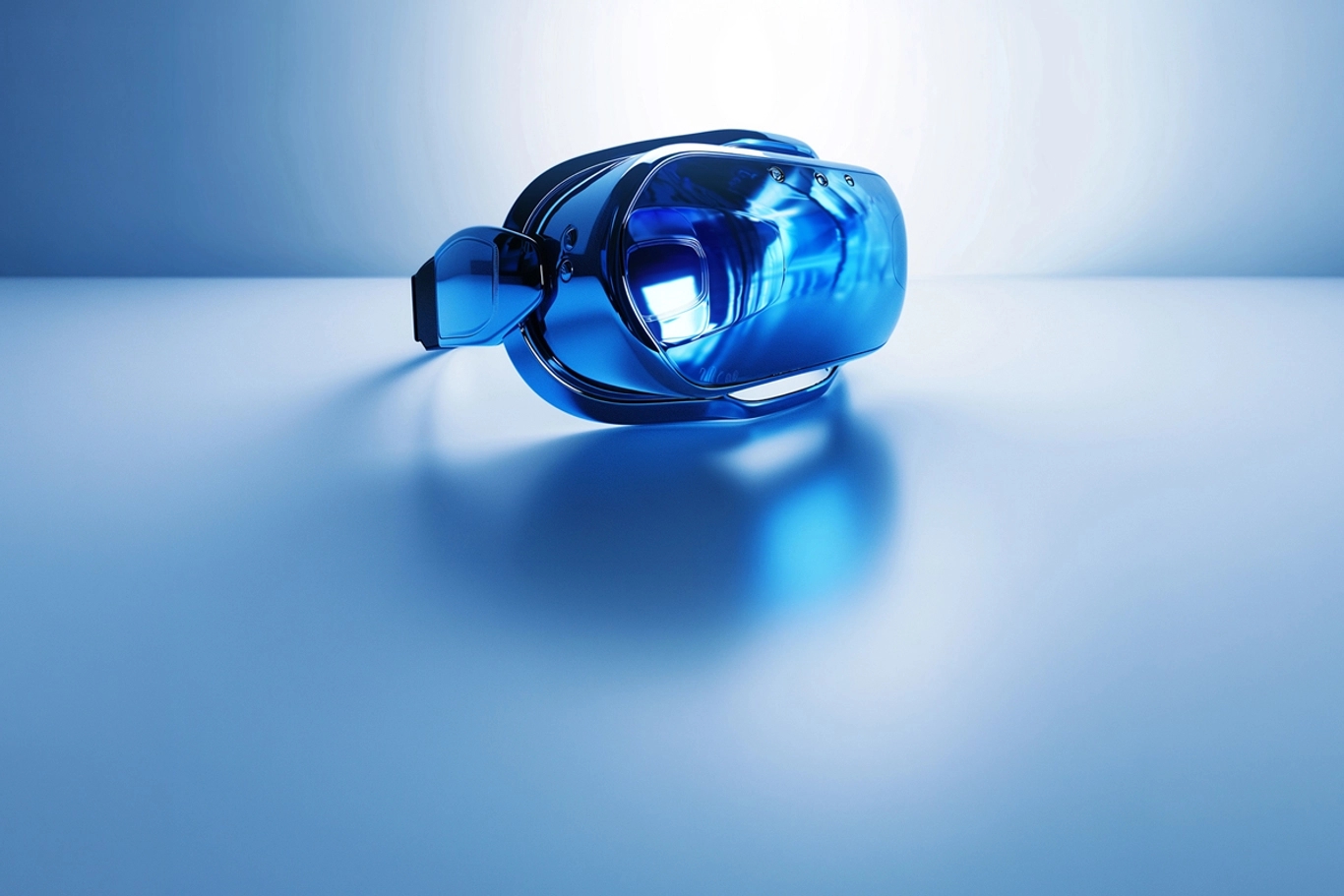 A blue virtual reality headset rests on a smooth, reflective surface under cool lighting.